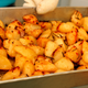 Baking pan full of crispy potatoes